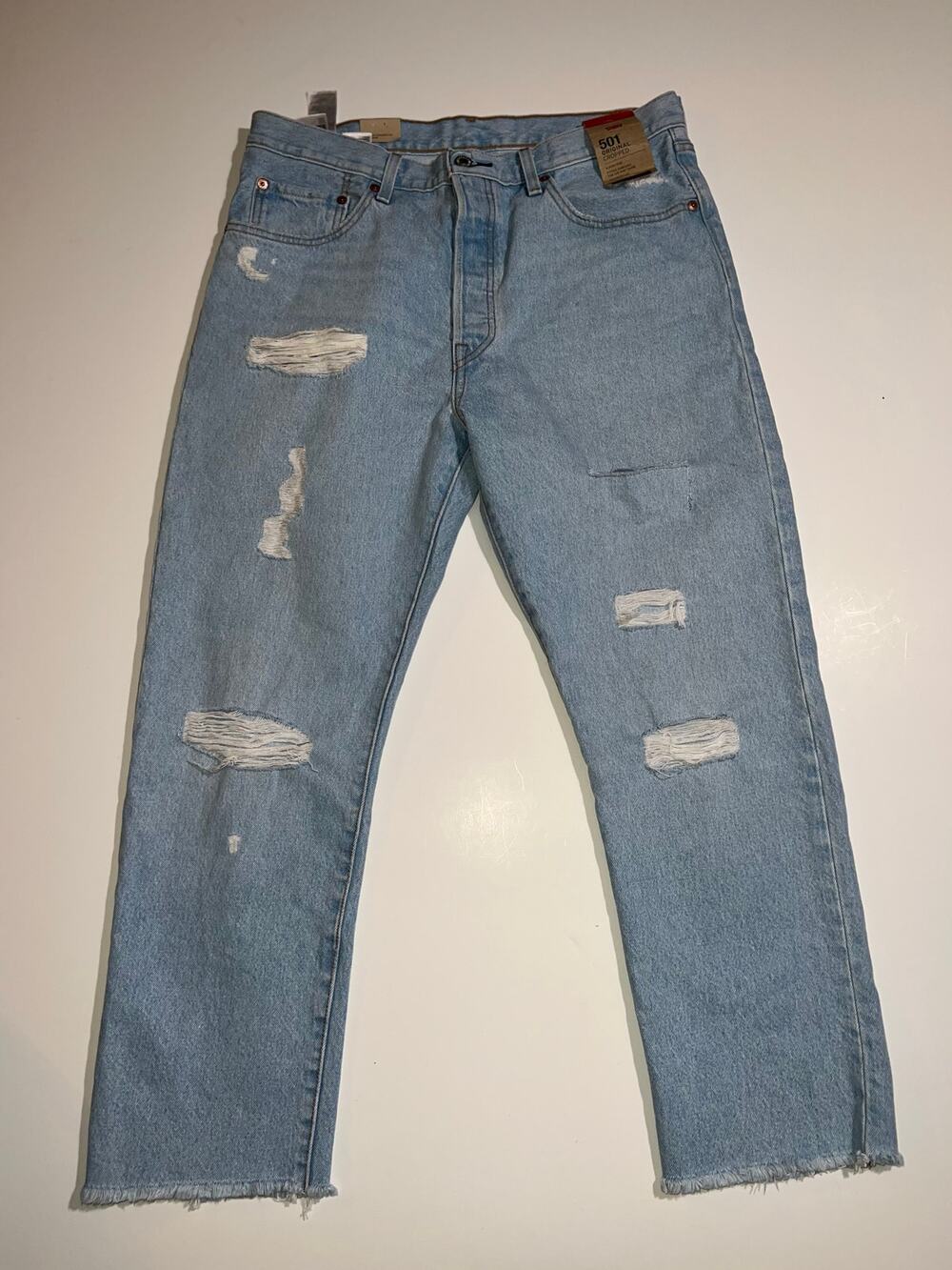 Levi’s Strauss New 501 chopped butterfly distressed straight leg blue jean